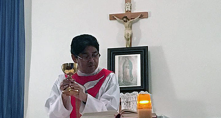 Accused priest back at pulpit