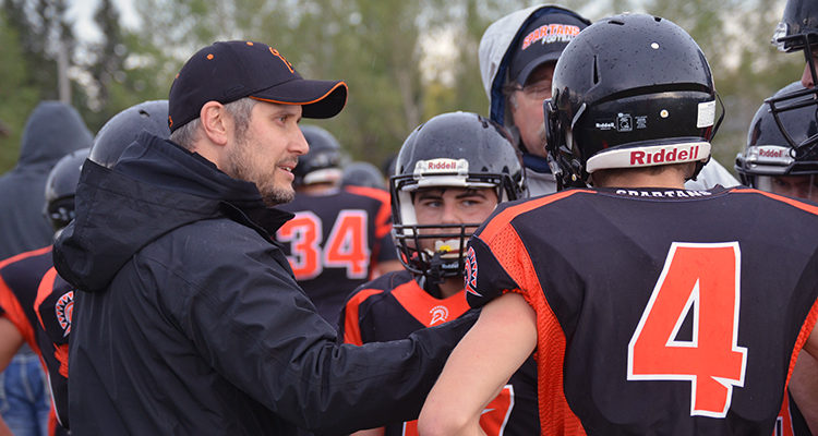 Football coach bids farewell