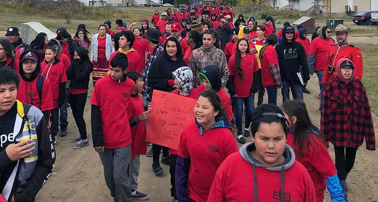 Anti-gang walk attracts 300-plus