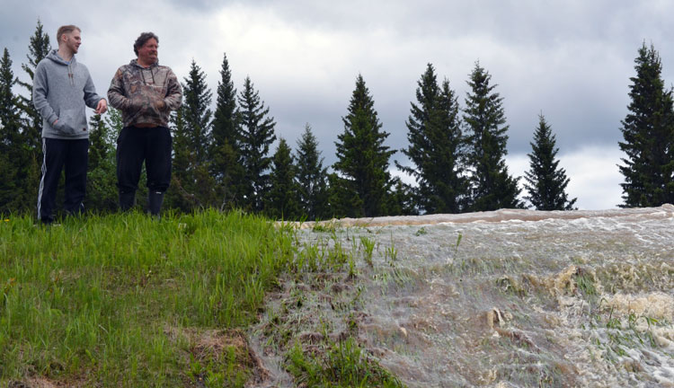 Rainfall, high water damages RM roads