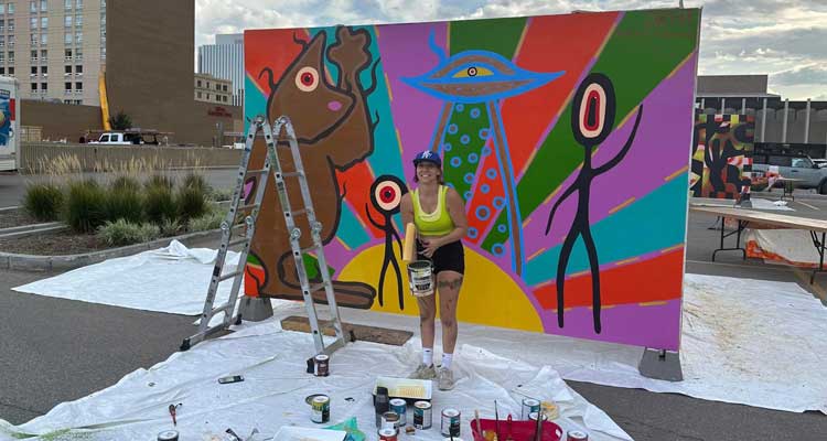 Former M.L. artist creates mural