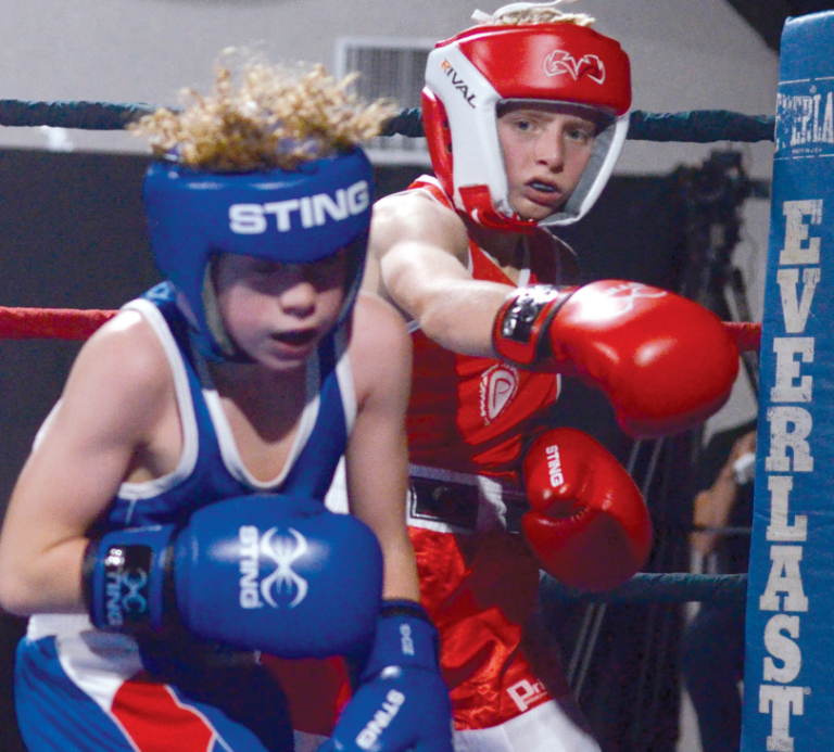 THE HITS KEEP ON COMING: Boxing card held in Meadow Lake